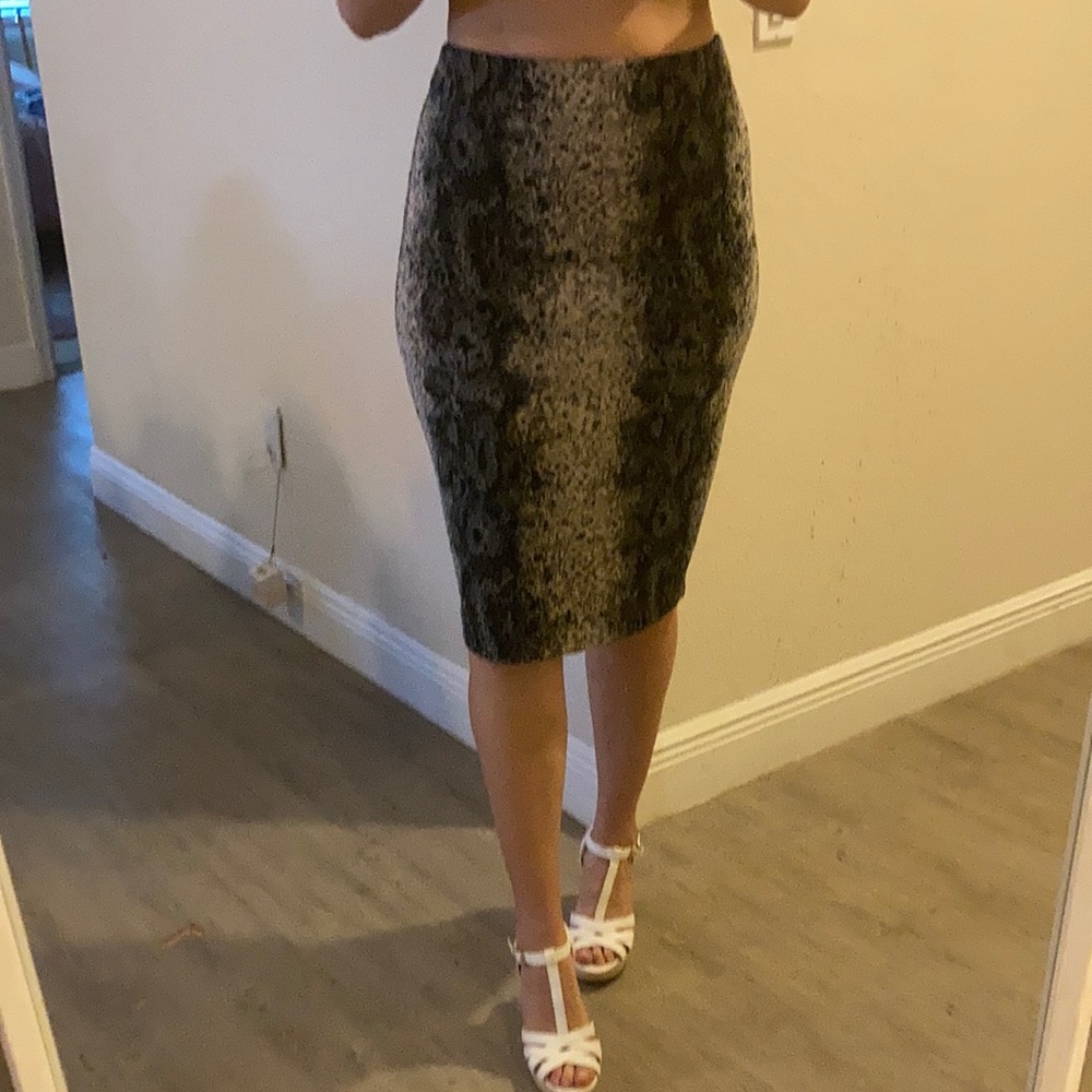 Printed pencil skirt. Business attire. High-waisted with four inch slit in back